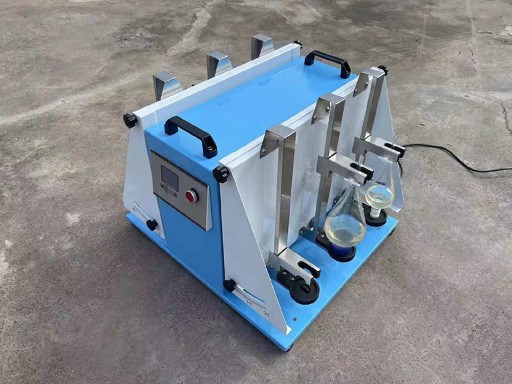 Pengayun corong pemisah makmal